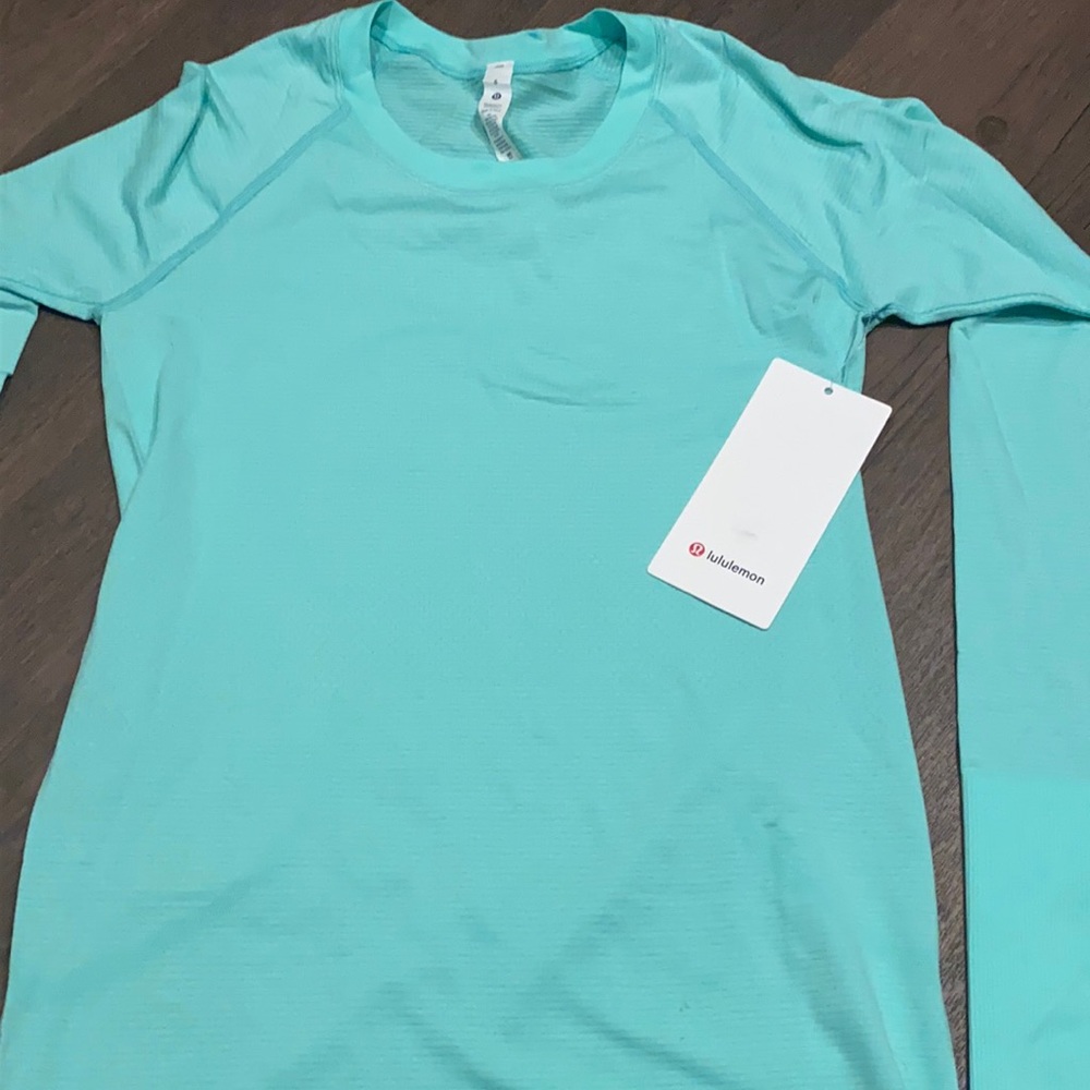 Lululemon Swiftly Tech Long Sleeve 2.0 size 6 last picture is more real.